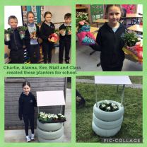 Some of P5 with planters they have made for school