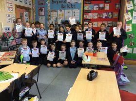 Happy faces with their Beyond Bricks Certificates